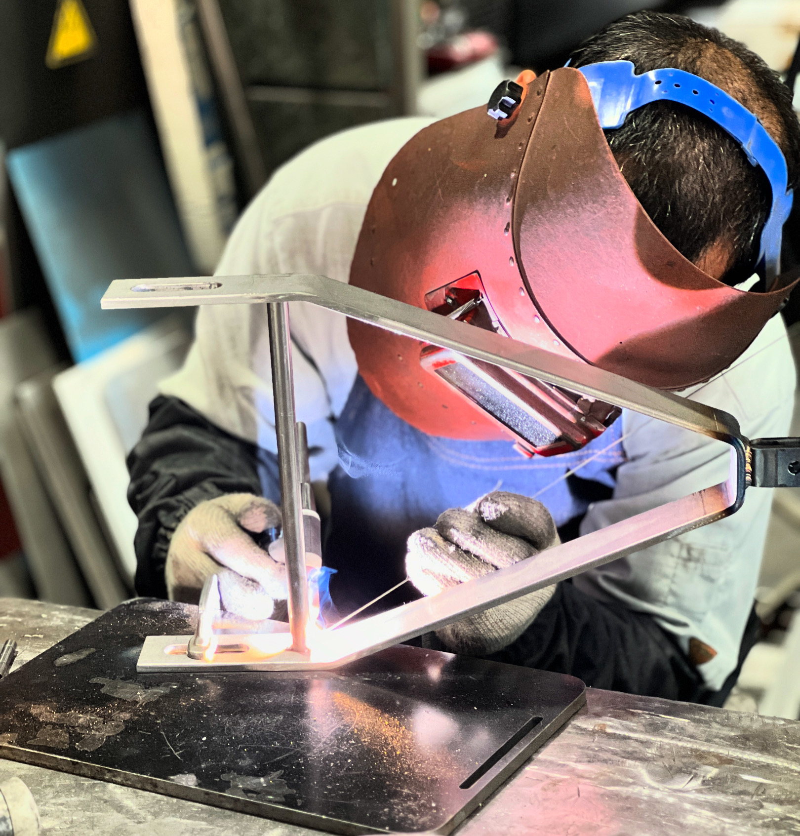 A welder at work in the SEIKO factory